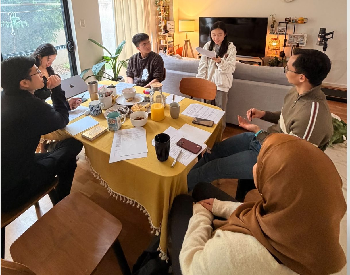 AGC peers around a table during a peer circle session