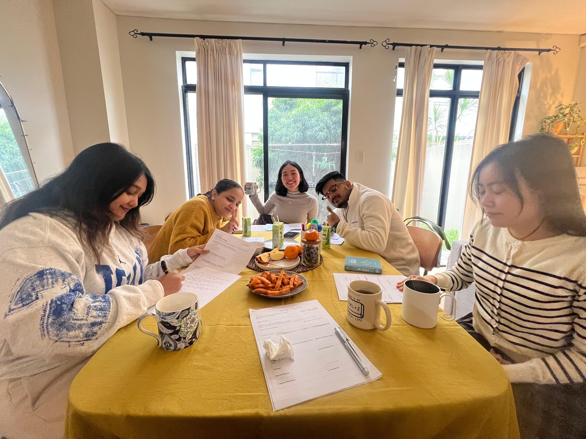 Members working through accountability workbooks